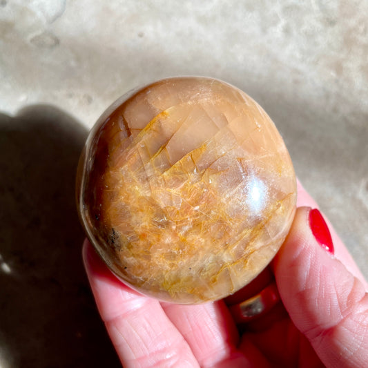 Peach Moonstone palm stone 5CM