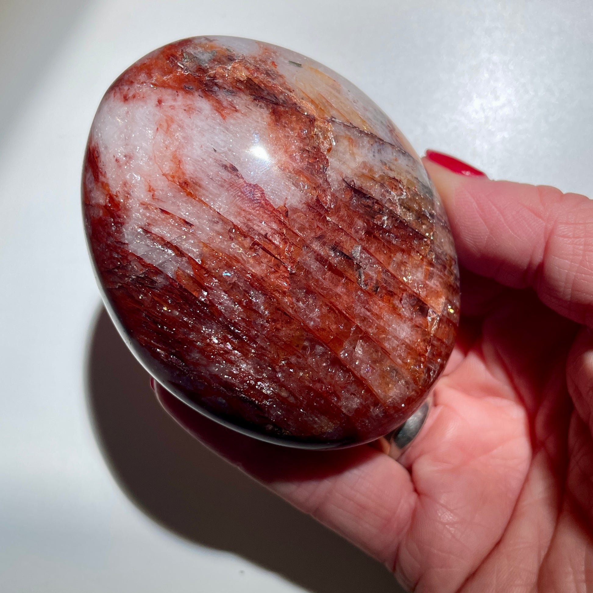 Fire Quartz Palm stone LG - 8CM