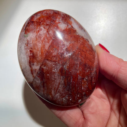 Fire Quartz Palm stone LG - 8CM