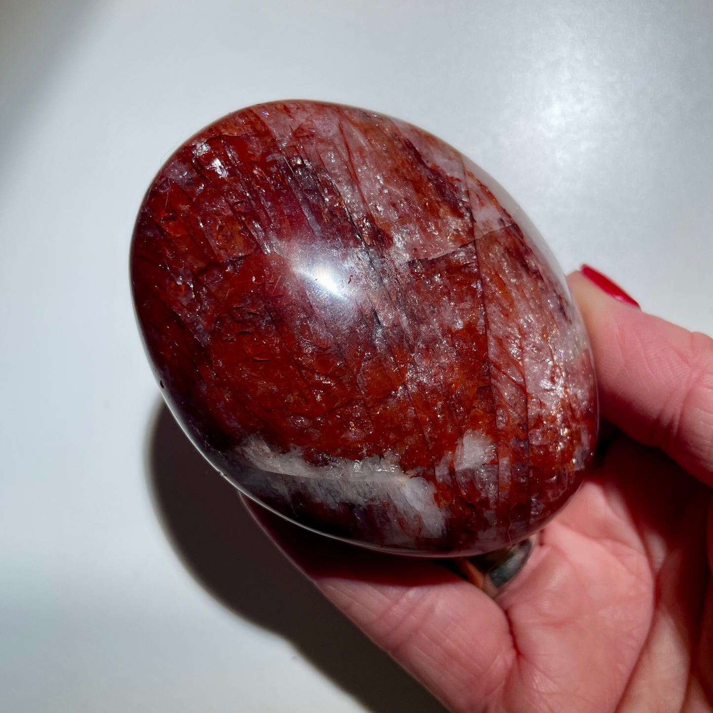 Fire Quartz Palm stone LG - 8CM