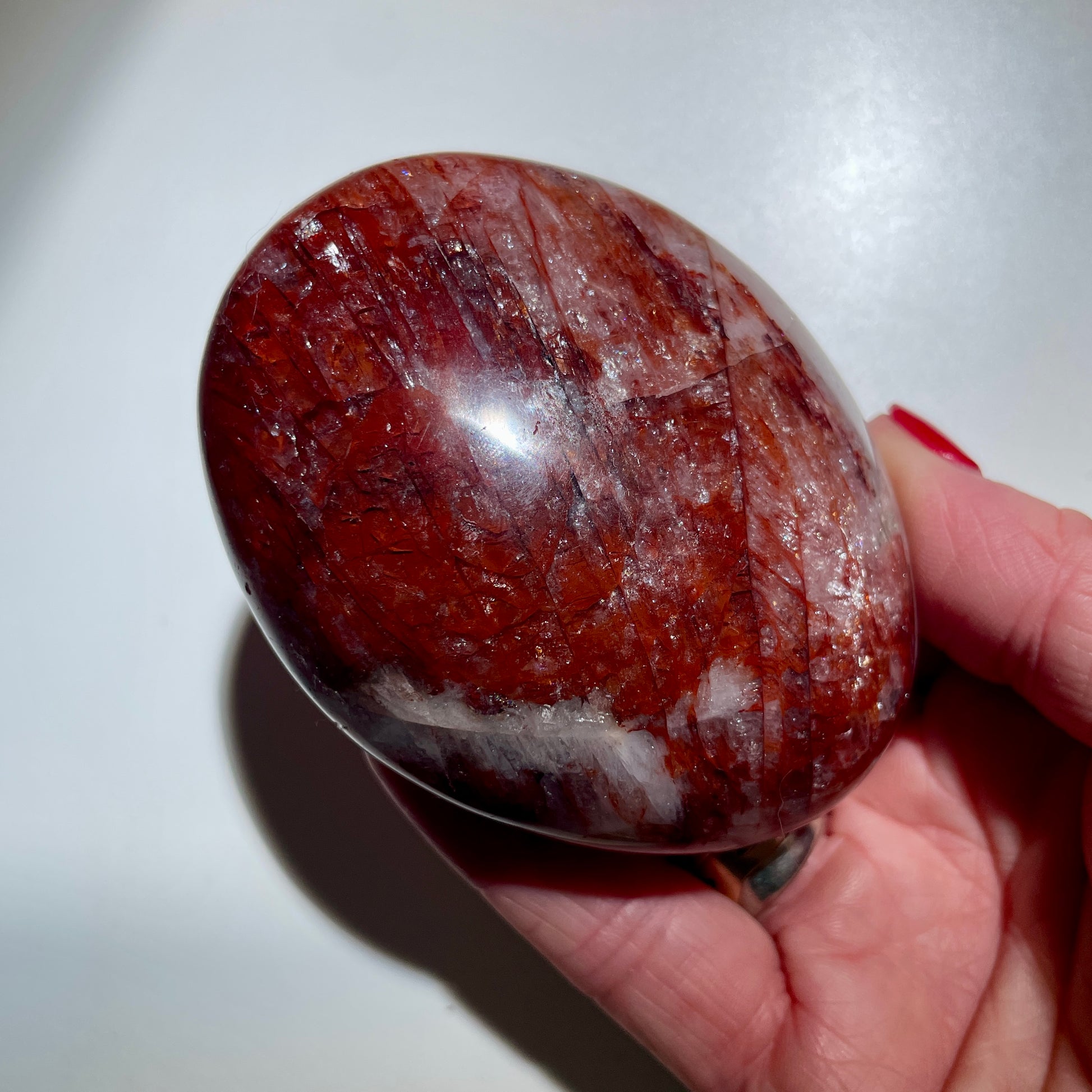 Fire Quartz Palm stone LG - 8CM