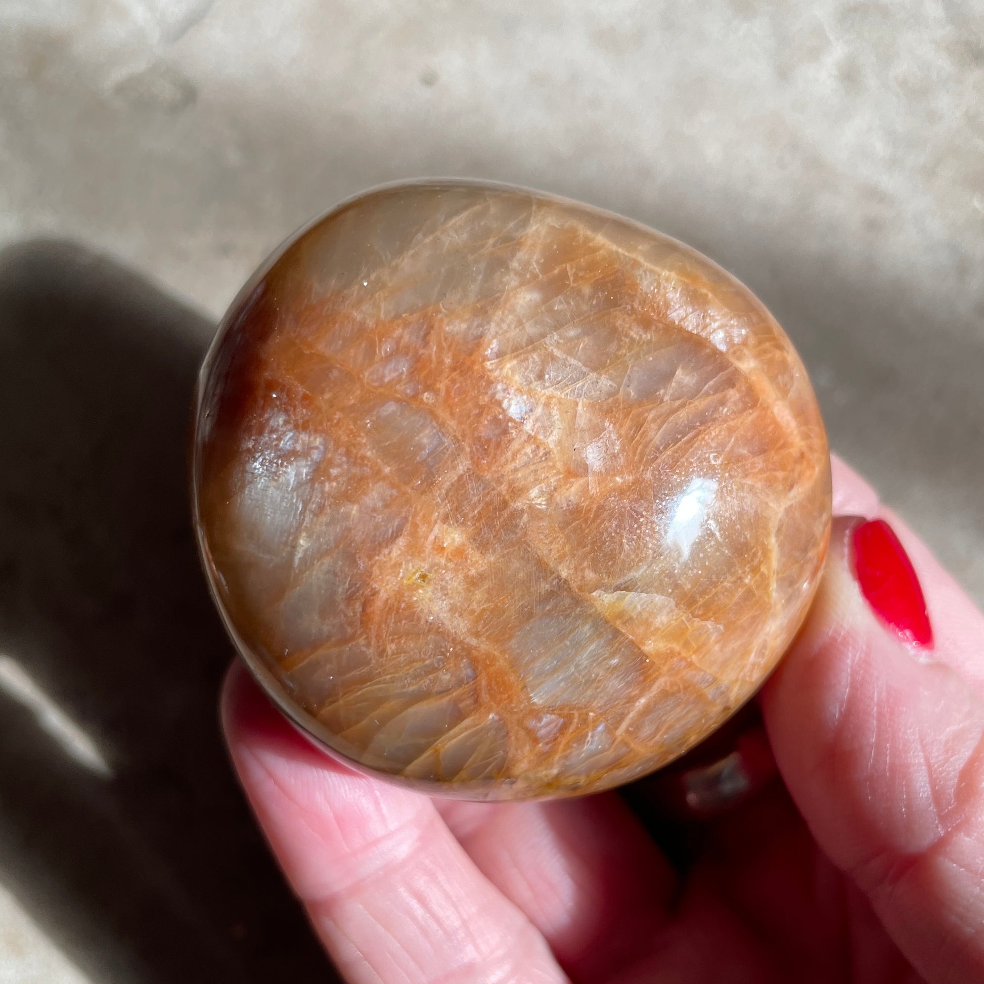 Peach Moonstone palm stone 5CM