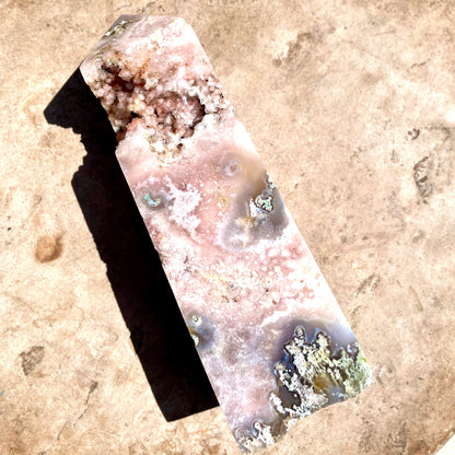 Pink and Purple Amethyst Tower with Druzy on bench