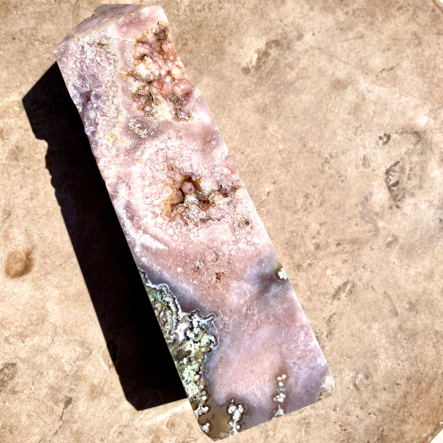 Pink and Purple Amethyst Tower with Druzy on bench