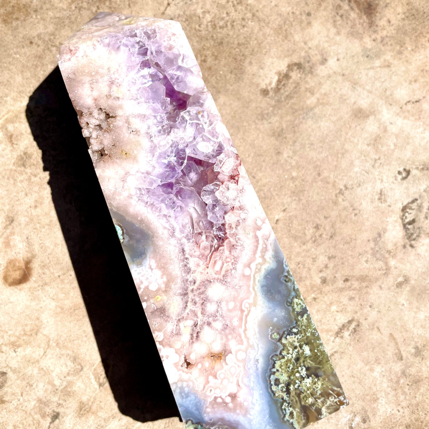 Pink and Purple Amethyst Tower with Druzy on bench