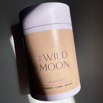 The Wild Moon Smudge Pack lying on a white bench.