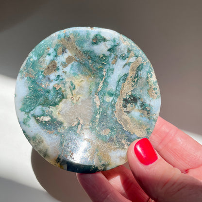 Hand holding Moss Agate Trinket Bowl 8cm